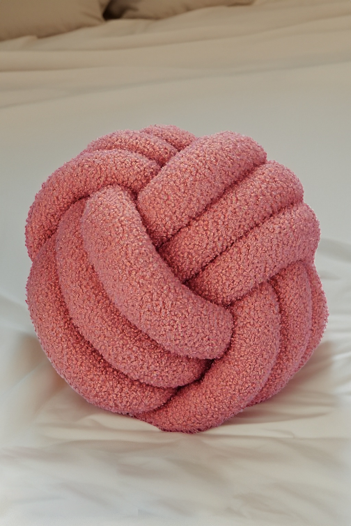 Pink knot best sale pillow