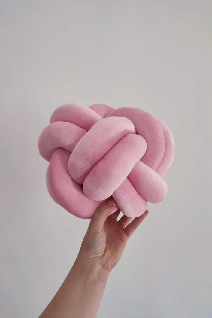 Pink knot pillow sale